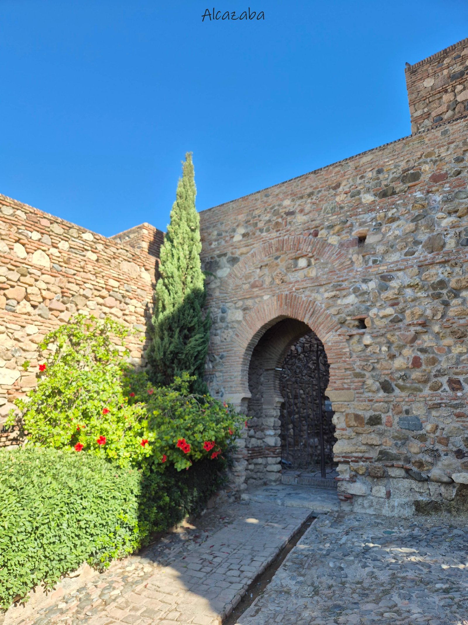 Malaga - Alcazaba - porte en pierre - ville - voyage